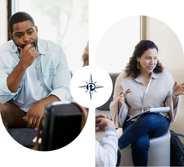 Two people engaged in a thoughtful conversation during a meeting.